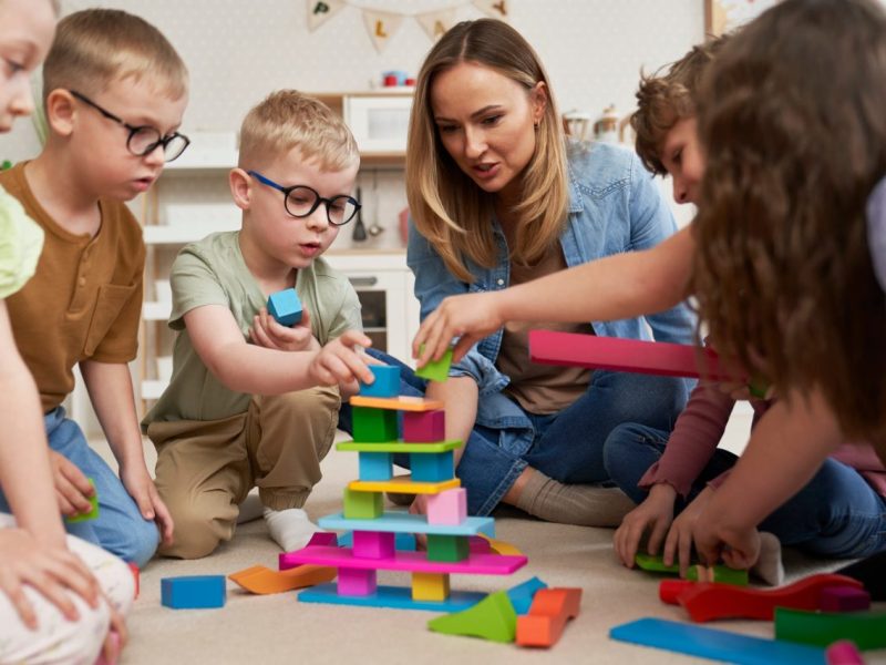 children-playing-with-toy-blocks-in-the-kindergarten.jpg